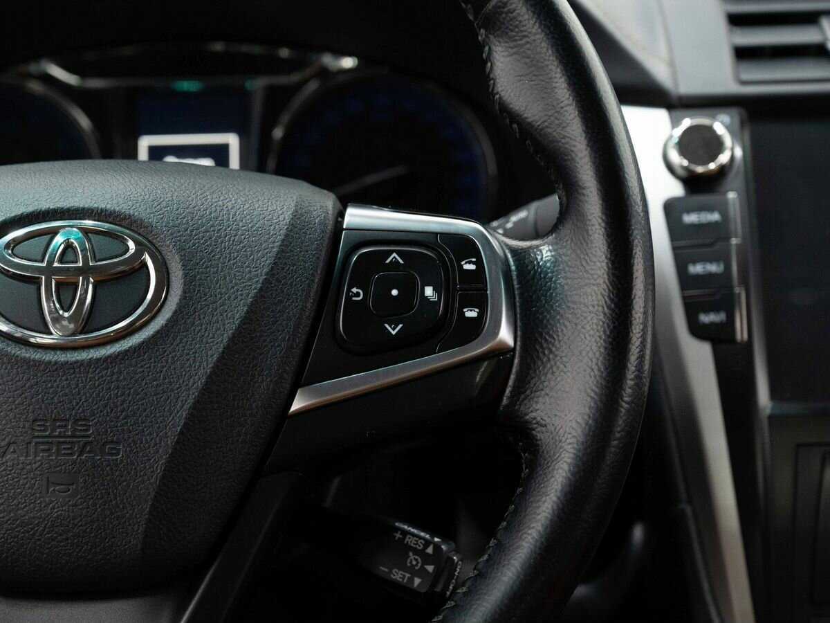 Б/У Тойота Камри 2017 года. Фото: #17