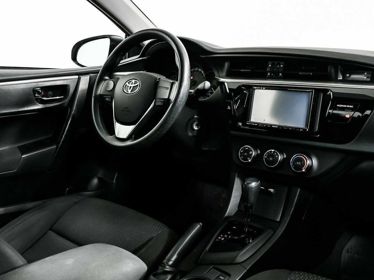 Б/У Тойота Королла 2013 года. Фото: #8