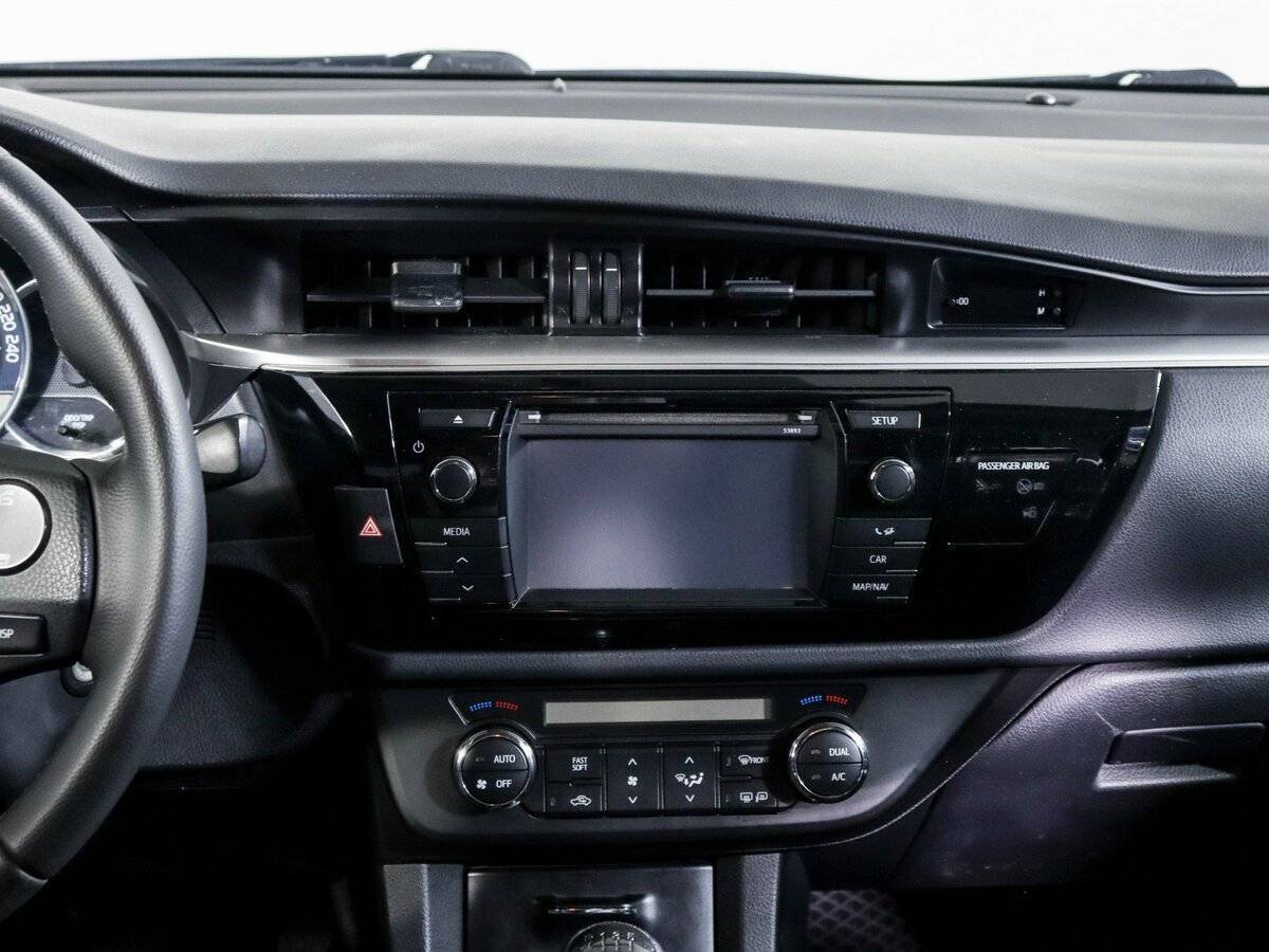 Б/У Тойота Королла 2014 года. Фото: #9