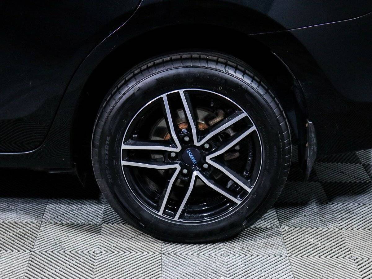 Б/У Тойота Королла 2014 года. Фото: #11