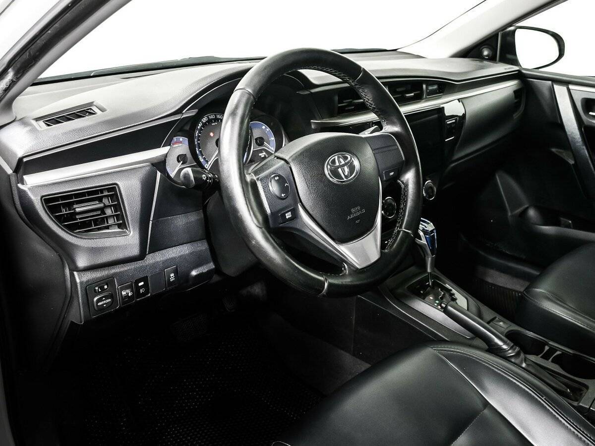 Б/У Тойота Королла 2013 года. Фото: #11