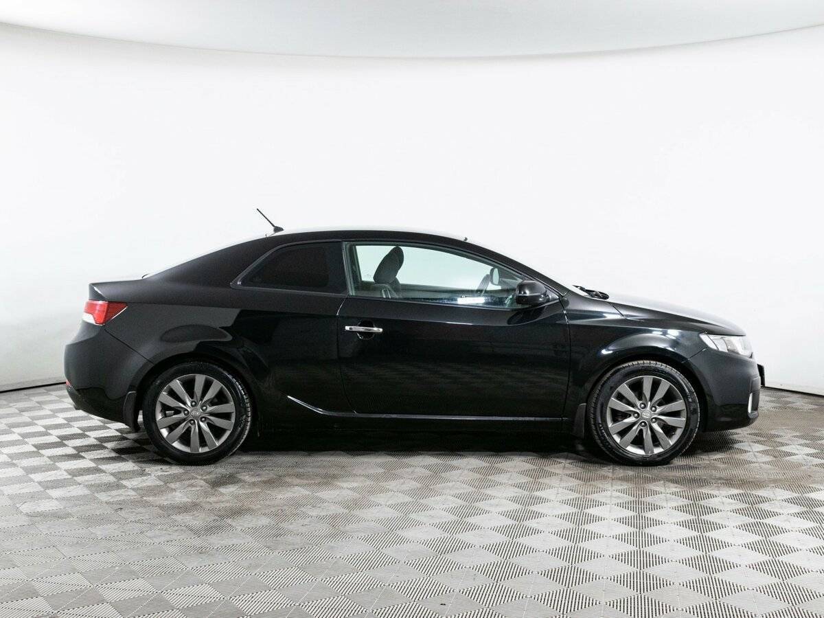 Kia Cerato 2012 года с пробегом. Фото: #3