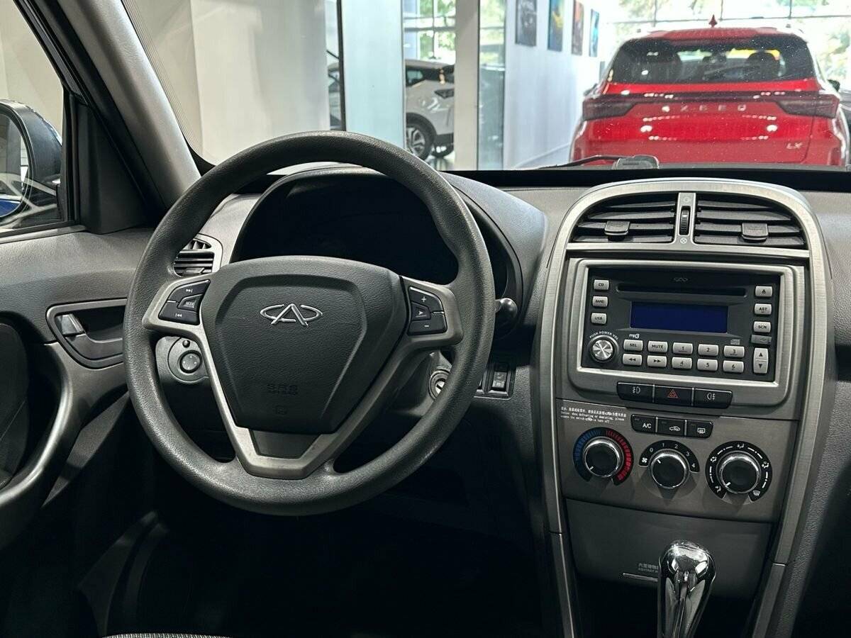 Chery Tiggo (T11) 2015 года с пробегом. Фото: #9