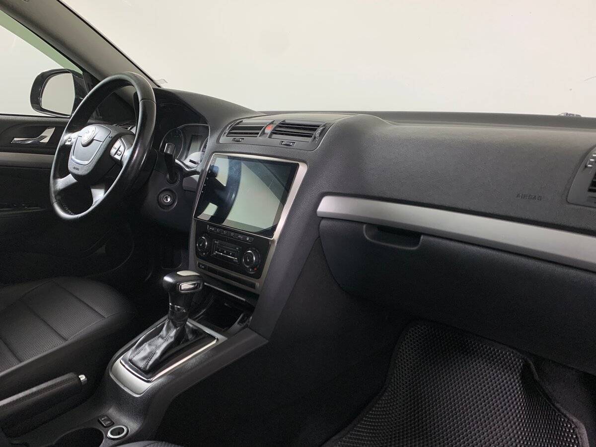 Skoda Octavia 2012 года с пробегом. Фото: #12